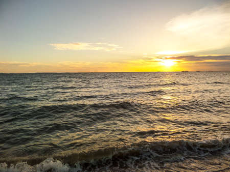 Sunset over sea in the evening at banglamung beachの写真素材