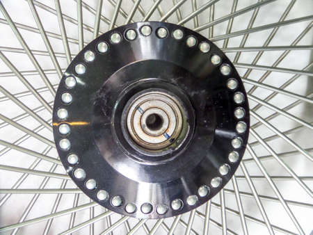 Close up to wire of motorbike wheelの写真素材