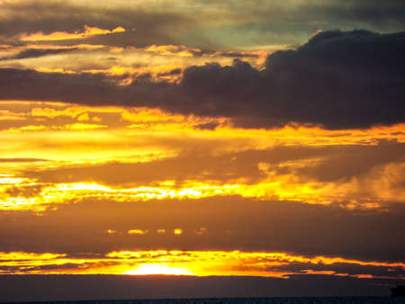 last of sunlight in the sky when sunsetの写真素材