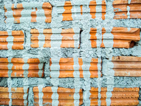 Brick wall outdoor near construction houseの写真素材