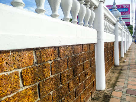 laterite texture wall at Djittabhawan Temple Banglamung Chonburi Thailandの写真素材