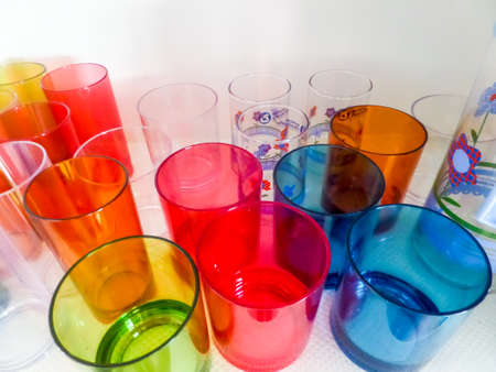 Drinking glass on the cupboard in kitchenの写真素材