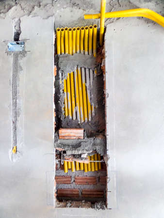 Brick and electric pipesの写真素材
