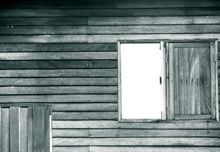 Wood windows and wood wall in front of the wood houseの写真素材