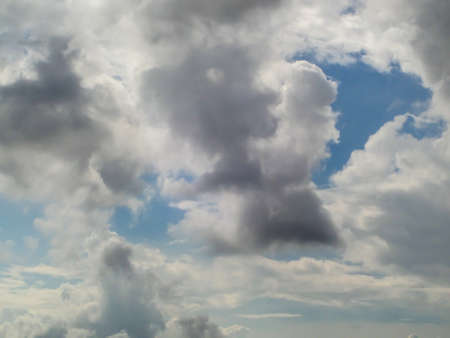 White cloud and the blue sky and sunshine in summer