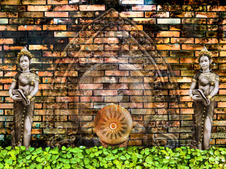 Dharmachakra sandstone carving transparent and ancient two angel and brick walの写真素材
