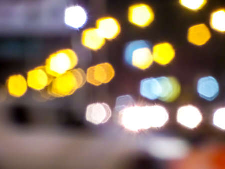 Bokeh and blur of traffic light and many vehicle on load and decorate public light