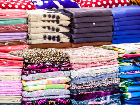 have towels in lots of sizes styles and colors  must see on the beach road in thailandの写真素材