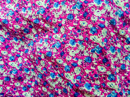 art on baby cloth and ware flower flora magenta backgroundの写真素材