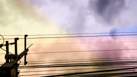 power electric lines and colorfull fantacy skyの写真素材