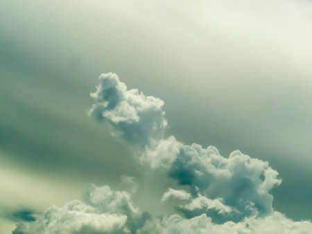 smoke blur cloud moving by wind and gray sky in rain seasonの写真素材