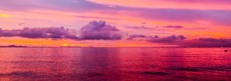 blur purple sea sunset panorama last light in eveningの写真素材