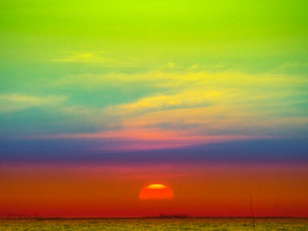 sunset colorful sky and cloud sunlight in the seaの写真素材