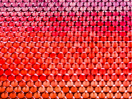 red tone stainless steel pieces background