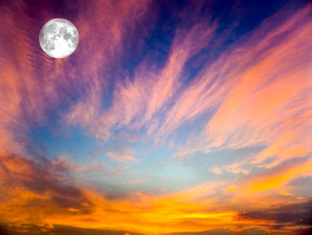 Eternal Flame,full moon on the sky and blur cloud in eveningの写真素材