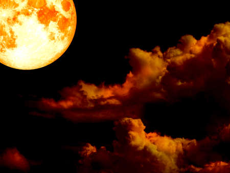 super blood moon in gold sky in the nightの写真素材