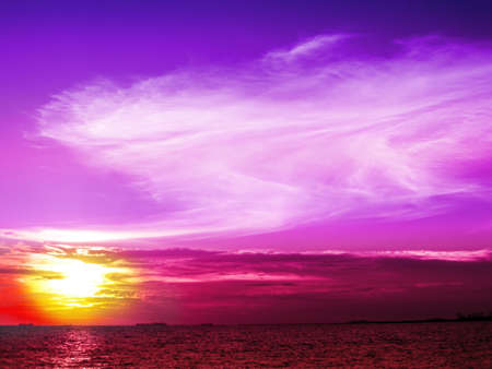 Sunset over sea in the evening at banglamung beachの写真素材