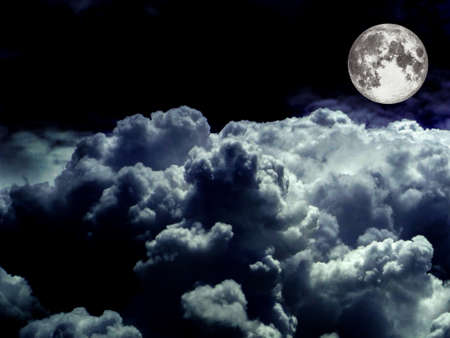 super moon heap white cloud in the night sky, Elements of this image furnished by NASAの写真素材