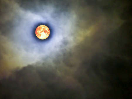 super blood moon and orange heap cloud