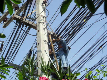 Chonburi, Thailand. Jan 8,2018 technician install and repairing and maintenance optical fiber cable