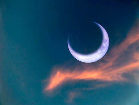 eclipse of the moon is a rare phenomenon same red phoenix cloudの写真素材