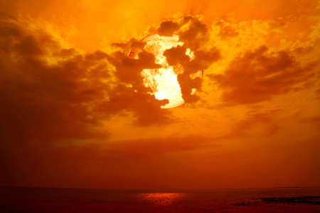 super full blood moon back silhouette dark red heap cloud in sea