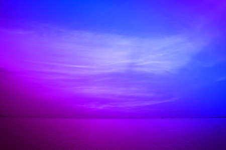 reflection of sunset heap cloud on sea surface