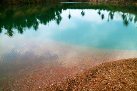 green blue water was born by Cabonate in sandstone and sunlight reflection. In lake of digging for...