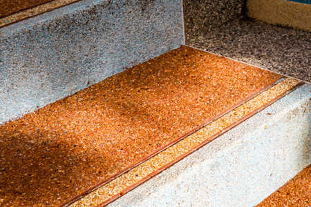 Naga thai art concrete stair way down top hill to foot mountain in forestの写真素材