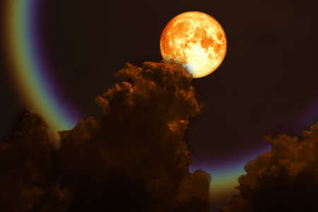 full blood moon back over silhouette dark red cloud