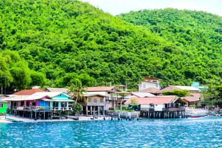 September 16, 2018. Ao Udom, Sriracha district Chonburi province Thailand, Fishing village on the coast The green hills and crystal clear waterのeditorial素材
