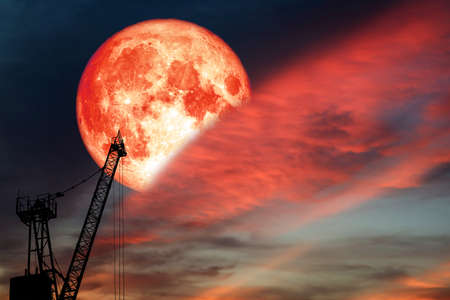 blood moon back on silhouette crane colorful cloud and rainbow on night sky