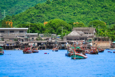 September 16, 2018. Ao Udom, Sriracha district Chonburi province Thailand, Fishing village on the coast The green hills and crystal clear water