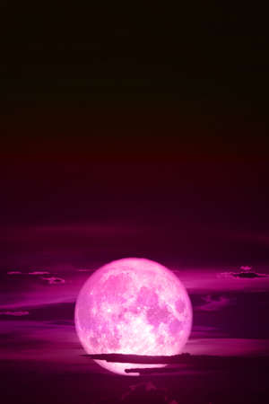 super snow pinkmoon back on night sky silhouette cloudの写真素材