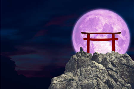 purple moon back torii over stone and rock of cliff, Elements of this image furnished byの写真素材