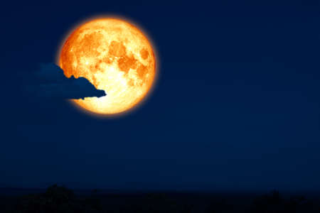full egg moon back on silhouette mountain on night sky, Elements of this image furnished by