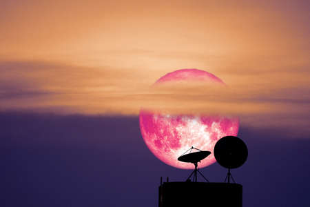 super Moon back on silhouette satellite dish on night sky, Elements of this image furnished byの写真素材