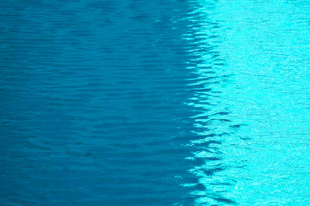 wave moving by wind on water surface of the swimming pool