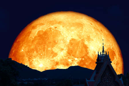 super moon back silhouette top gate of temple in Visakha Bucha Dayの写真素材