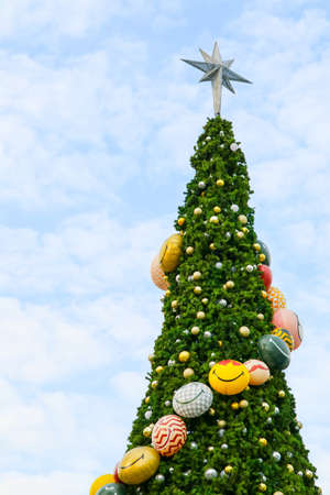 Christmas tree has green leaves and decorated with various items to celebrate Christmas festival and new yearの写真素材
