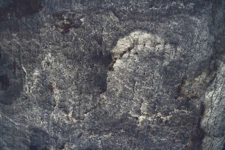 ancient gray ashes granite stone surface of cave for interior wallpaper and background