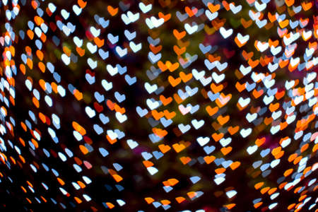 orange blue blur heart shape love valentine day night light on tree in garden