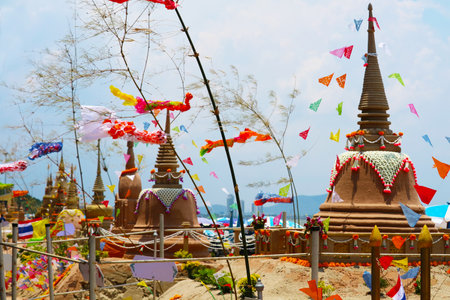sand pagodas in Songkran festival represents In order to take the sand scraps attached to the feet from the temple to return the temple in the shape of a sand pagodaのeditorial素材
