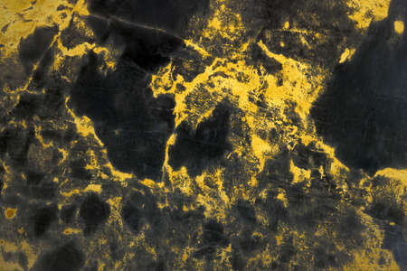 mineral light gold lava granite stone surface of cave for interior and wallpaper backgroundの写真素材