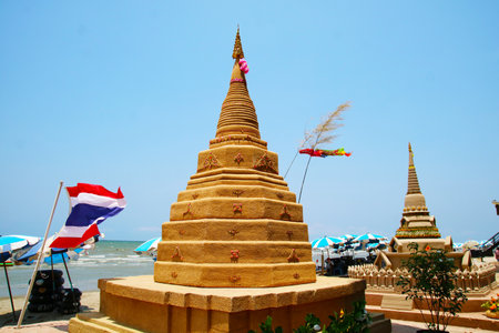 Octagon sand pagoda in Songkran festival represents In order to take the sand scraps attached to the feet from the temple to return the temple in the shape of a sand pagodaの写真素材