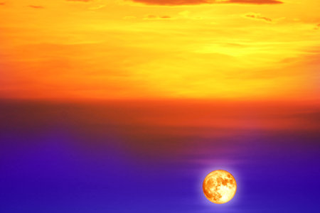blood moon lower right flame colorful purple yelllow orange skyの写真素材