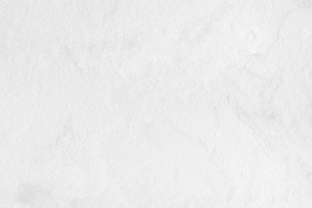 Close-up of a seamless white marble texture with subtle gray veining. Ideal for backgrounds, design, and architectural projects.の写真素材