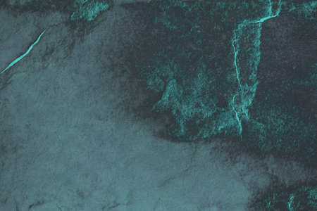 Glows blue on countertops granite texture backgroundの写真素材