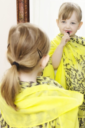 preschool girl playing dressing upの写真素材