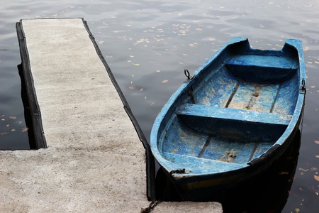 Old boat next to the shore